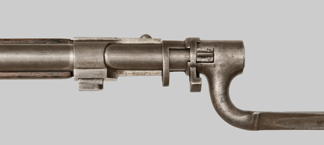 Close-up image of Uruguayan Mauser M1871 Socket Bayonet mounted to Mauer rifle.