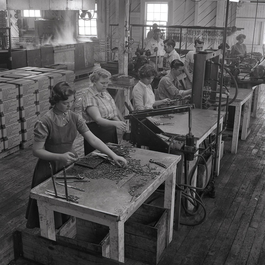 The primary assembly line, showing attaching of crosspiece and latch plate assembly to the blade.